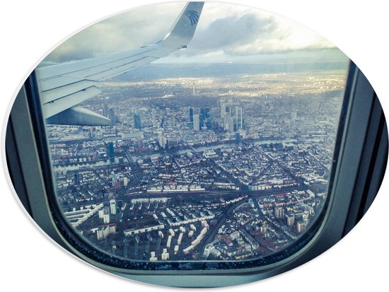 PVC Schuimplaat Ovaal - Uitzicht over Bebouwde Stad vanuit Vliegtuig - 40x30 cm Foto op Ovaal (Met Ophangsysteem)
