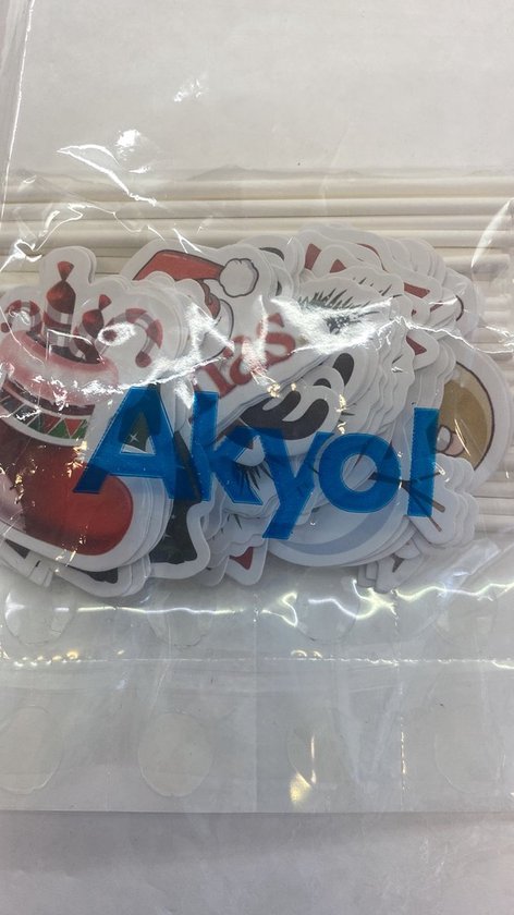 Stickers met kerstthema zoals kerstmutsen, kerstballen en de tekst 'Akyol' in blauw.