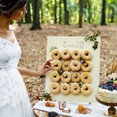 Donut wall bruiloft gender reveal of baby shower