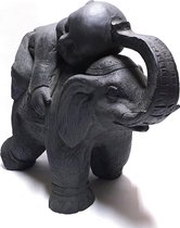 Garden kindmonnik liggend op olifant. Hoogte 57 cm. Dark-grey
