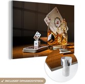 MuchoWow® Glasschilderij 60x40 cm - Schilderij acrylglas - Whisky en goochelen - Foto op glas - Schilderijen