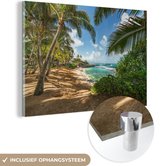 MuchoWow® Glasschilderij 60x40 cm - Schilderij acrylglas - Uitzicht op de zee tussen de palmbomen op Maui - Foto op glas - Schilderijen