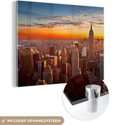 MuchoWow® Glasschilderij 80x60 cm - Schilderij acrylglas - Skyline - New York - Zon - Foto op glas - Schilderijen
