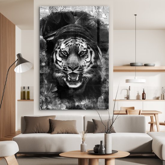 MuchoWow® Glasschilderij 100x150 cm - Schilderij acrylglas - Tijger met een capuchon op een achtergrond van kranten - zwart wit - Foto op glas - Schilderijen