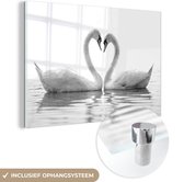 MuchoWow® Glasschilderij 120x80 cm - Schilderij acrylglas - Zwanen in hartvorm - zwart wit - Foto op glas - Schilderijen