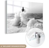 MuchoWow® Glasschilderij 120x80 cm - Schilderij acrylglas - De Franse Vuurtoren van la Jument in een storm - zwart wit - Foto op glas - Schilderijen