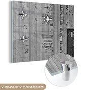 MuchoWow® Glasschilderij 120x90 cm - Schilderij acrylglas - Vliegveld van boven - zwart wit - Foto op glas - Schilderijen
