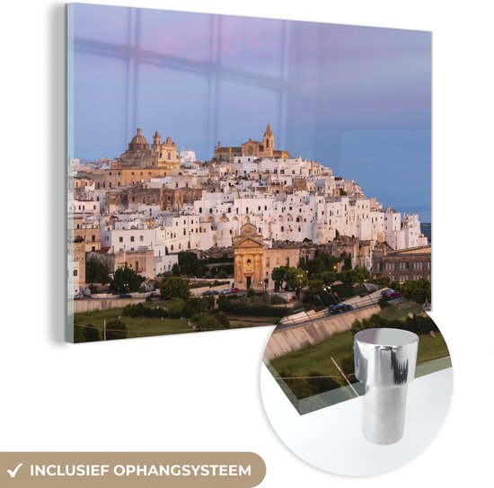 MuchoWow® Glasschilderij 180x120 cm - Schilderij acrylglas - Skyline van Ostuni in Italië - Foto op glas - Schilderijen