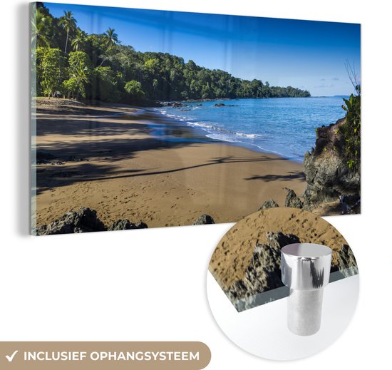 MuchoWow® Glasschilderij 120x60 cm - Schilderij acrylglas - Leeg strand en blauw water bij het Nationaal park Corcovado in Costa Rica - Foto op glas - Schilderijen