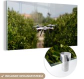 MuchoWow® Glasschilderij 40x20 cm - Schilderij acrylglas - Drone in de landbouw - Foto op glas - Schilderijen