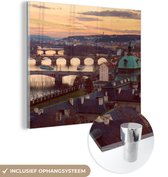 MuchoWow® Glasschilderij 90x90 cm - Schilderij acrylglas - Praag - Zon - Architectuur - Foto op glas - Schilderijen