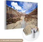 MuchoWow® Glasschilderij 120x80 cm - Schilderij acrylglas - Touwbrug door de Himalaya - Foto op glas - Schilderijen