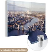 MuchoWow® Glasschilderij 180x120 cm - Schilderij acrylglas - Skyline van London met de Tower Bridge - Foto op glas - Schilderijen