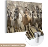 MuchoWow® Glasschilderij 180x120 cm - Schilderij acrylglas - Paarden - Zand - Kudde - Foto op glas - Schilderijen