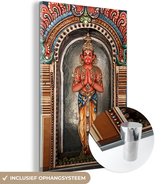 MuchoWow® Glasschilderij 80x120 cm - Schilderij acrylglas - Het Hanuman standbeeld in de tempel Sri Ranganathaswamy - Foto op glas - Schilderijen