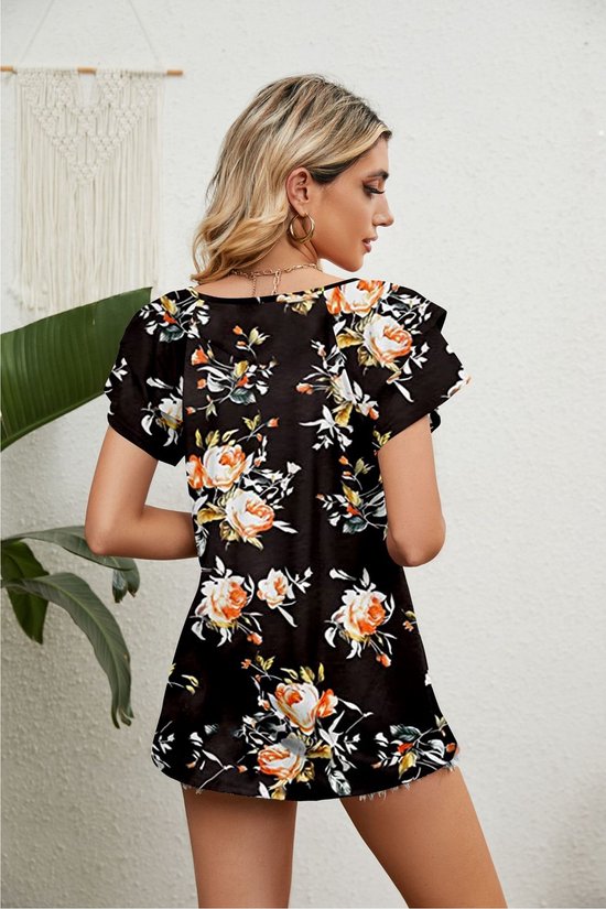 Blouse femme à col en V et manches courtes papillon, noire avec un imprimé floral de fleurs oranges et blanches.
