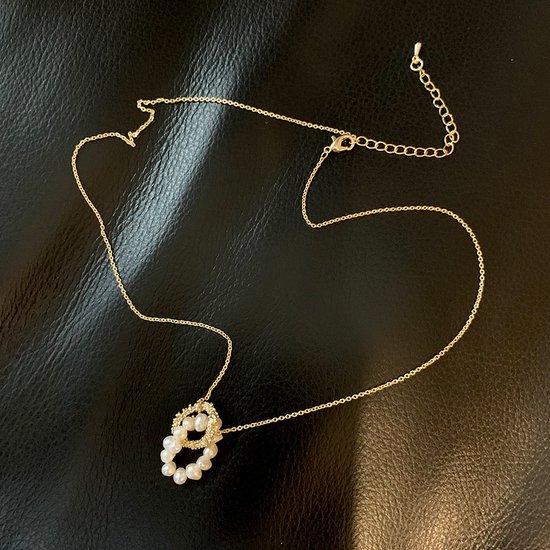 Fashion jewelry|Dames Ketting|Valentijns cadeau| gift|verrassing|Kruisende cirkels|Parel