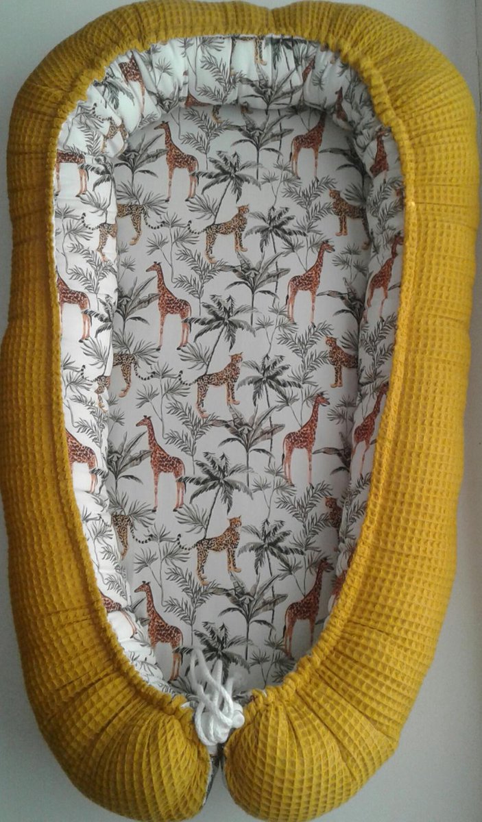 Bol.com Babynestje (Oker/wit met jungledieren) aanbieding