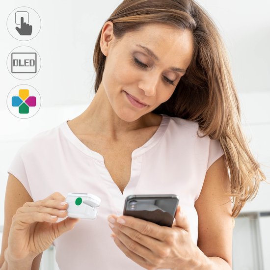 Medisana PM 100 — wit en grijs met groene bediening