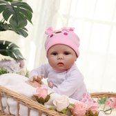 Reborn baby pop &#x27;Lily&#x27; - 55 cm - Meisje met roze outfit, speen en fles - Bruin haar - Soft vinyl - Levensechte babypop - In geschenkdoos, gebruikt tweedehands  Nederland