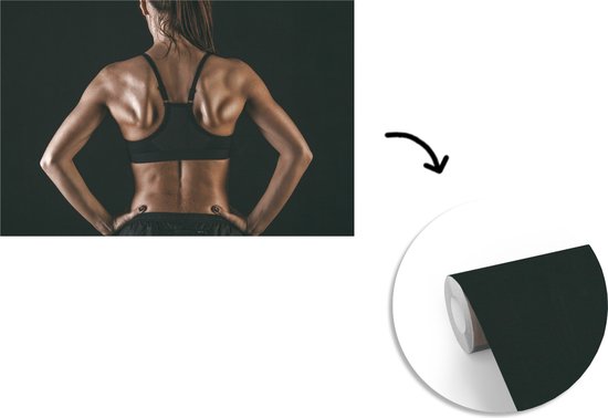 Papier peint photo vinyle - Le dos et les épaules d'une femme qui pratique clairement le fitness largeur 390 cm x hauteur 260 cm - Tirage photo sur papier peint (disponible en 7 tailles)
