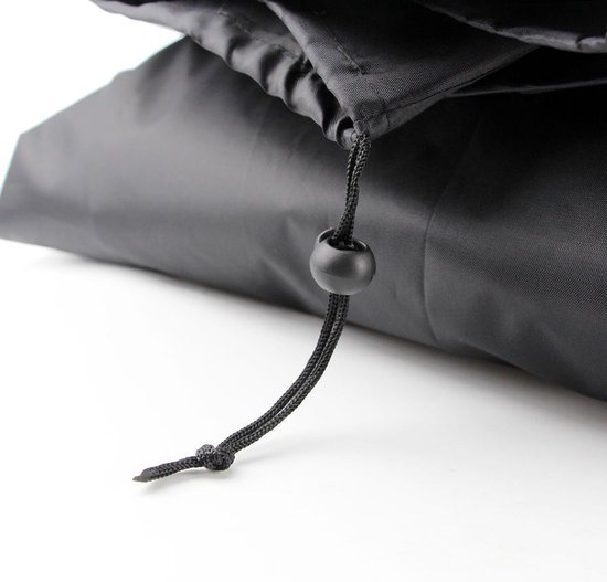 Close-up van een zwart koord met stopper op een beschermhoes.