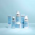 Collectie Biodermal Pigment producten: serum, dagcrème en nachtcrème in witte en lichtblauwe verpakking.