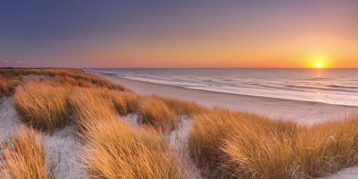 karo-art Schilderij - Zonsondergang op Texel, Noordzee , 2 maten , Premium Print, Oranje, blauw, Prachtig duinlandschap met uitgebreid zicht op de Noordzee, Woon- en slaapkamer Multikleur