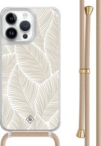 Casimoda® hoesje met beige koord - Geschikt voor iPhone 14 Pro Max - Palm Leaves Beige - Afneembaar koord - TPU/polycarbonaat - Bruin/beige