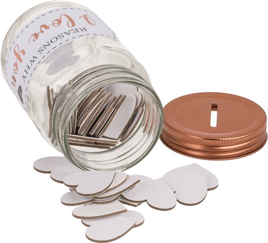 Omgevallen glazen pot gevuld met hartjes, met koperkleurig deksel ernaast. Tekst 'REASONS WHY I love you' op het etiket. Losse hartjes liggen rondom.