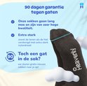 Zwarte sok met blauwe band en witte 'Heavenly' opdruk, met wolkjes