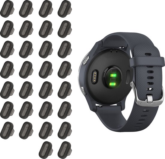 Montre de sport gris foncé avec capteur de fréquence cardiaque, à côté d'une rangée de 26 bouchons de port de chargement noirs.