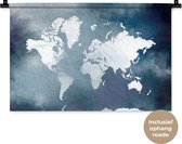 Wandkleed WereldkaartenKerst illustraties - Lichtgekleurde wereldkaart op een achtergrond van blauwe waterverf Wandkleed katoen 60x40 cm - Wandtapijt met foto