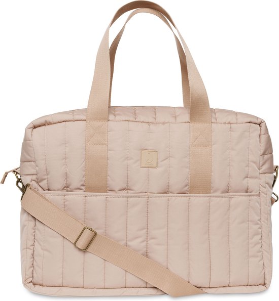 Sac à langer matelassé rose avec poignées en tissu, logo Jollein et bandoulière.
