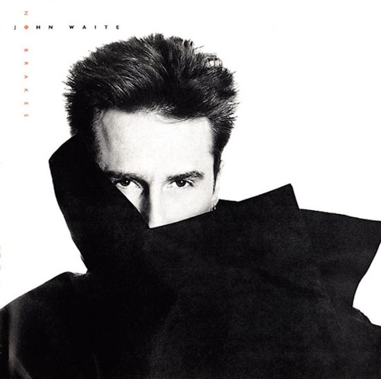 Albumhoes van 'No Brakes' van John Waite, met close-up van zijn gezicht.