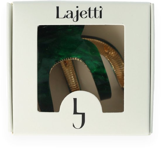 Lajetti haarklem in een doos met een venster. De klauw is groen met gouden details.