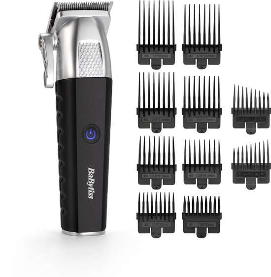 Zwarte en zilveren BaByliss tondeuse met aan/uit knop en tien opzetkammen. Verpakking wordt getoond.
