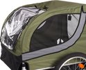 Detail van een groene fietskar met een doorzichtig dakraam en mesh zijkanten.