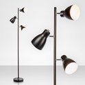 Zwarte staande lamp met drie verstelbare spots. Close-ups tonen de spots en hun verstelbaarheid.