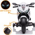 Elektrische witte Honda CBR 1000RR kinder motorfiets met LED koplampen en gaspedaal.