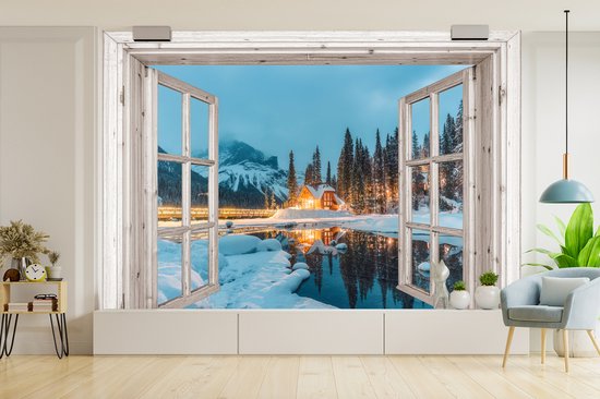 Behang - Fotobehang Doorkijk - Winterlandschap - Natuur - Huis - Bergen - Breedte 525 cm x hoogte 350 cm