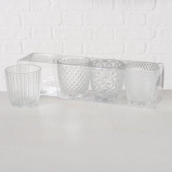 Set van 4 glazen waxinelichthouders, elk met een ander patroon: verticale lijnen, ruitjes, sterren en bolletjes.
