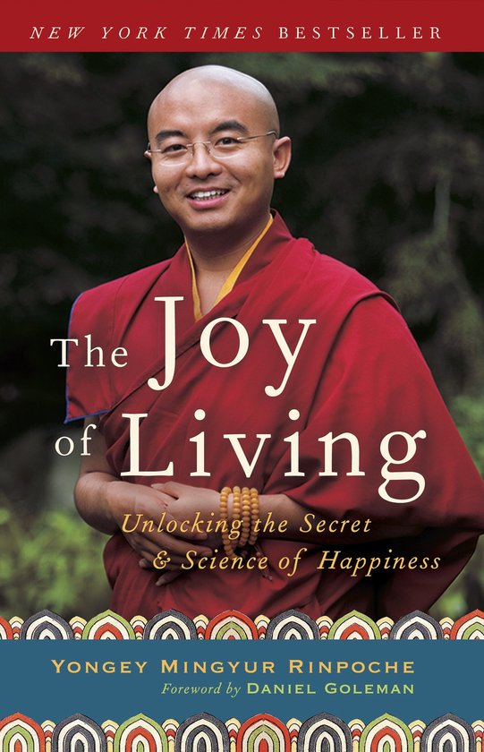 Bestseller du New York Times "The Joy of Living". Un moine bouddhiste en robe rouge, portant des lunettes.