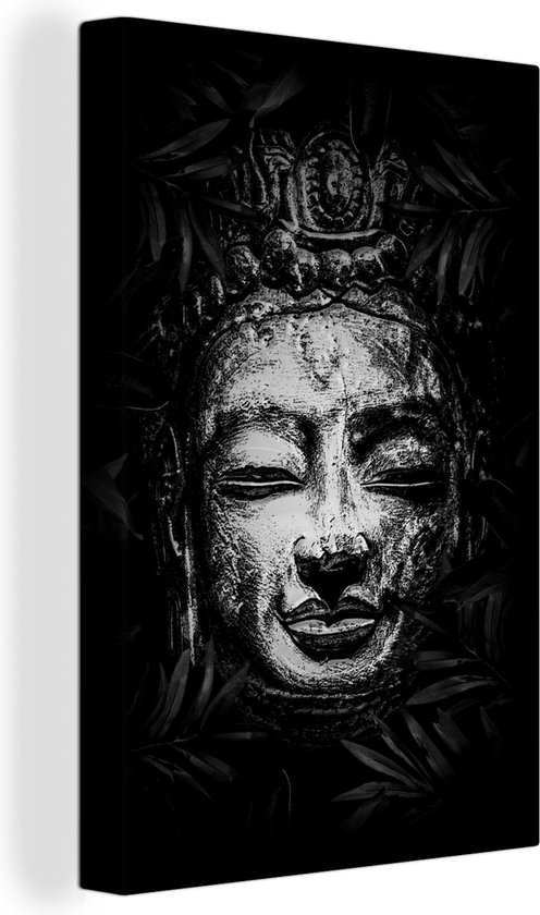 Canvas Schilderij Ruw hoofd van een Boeddha met tropische bladeren rondom - zwart wit - 40x60 cm - Wanddecoratie