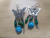 blauw/groene vlinder oorbellen