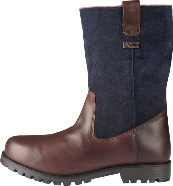 Botte en cuir marron avec tige en daim bleu foncé, boucle en cuir et logo Horka.