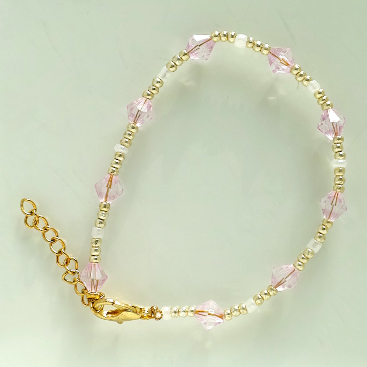 Sprankelende armband - goud, roze en wit