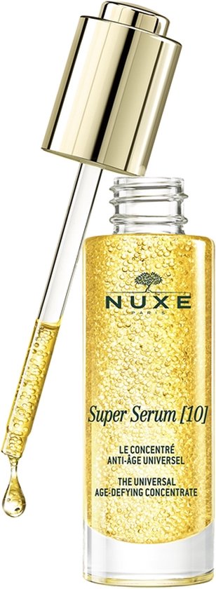 Gouden Nuxe Super Serum [10] met pipet, een druppel serum valt van de druppelbuis.