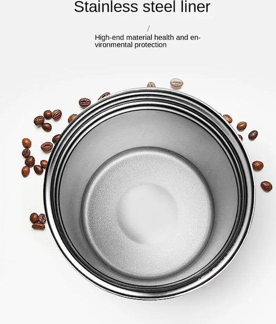 Binnenzijde van een roze koffiebeker, diep RVS met koffiebonen eromheen.