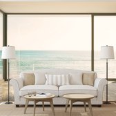 Fotobehangkoning - Behang - Vliesbehang - Fotobehang - Uitzicht op Zee door het Raam 3D - 250 x 175 cm